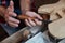 Luthier woodworking with chisel