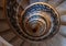 The Lutyenâ€™s stair, spiral stone staircase designed by Edwin Lutyens in the 1920s, located in the Ned Hotel, City of London UK