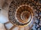 The Lutyenâ€™s stair, spiral stone staircase designed by Edwin Lutyens in the 1920s, located in the Ned Hotel, City of London UK