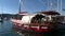 Luxe rich wooden yachts stand on background of blue sky in harbor of Turkey.