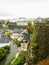 Luxembourg City with Alzette River passing through the Grund Quarter and Abbey de Neumunster.