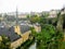 Luxembourg City with Alzette River passing through the Grund Quarter and Abbey de Neumunster.