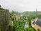 Luxembourg City with Alzette River passing through the Grund Quarter and Abbey de Neumunster.