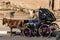 Luxor Egypt 23.05.2018 Tourist Caleche horse carriage outside Luxor temple in Background