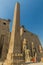 LUXOR, EGYPT - FEB 20, 2019: Ramesses II obelisk in front of the Luxor temple pylon, Egy