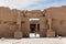 Luxor, Egypt - September 21, 2021: The temple of Ramses III with Osiris pillars in the courtyard, Karnak, Egypt