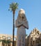 Luxor Egypt. Statue of Ramses II with his daughter Merit-Amon