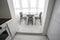 luxure hall interior loft flat in grey style design with chairs and table