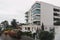 luxurious apartments building surrounded by trees and plants