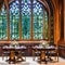 A luxurious, art nouveau dining room with stained glass windows, ornate furnishings, and nature-inspired motifs3, Generative AI