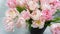 Luxurious bouquet of pink tulips on a gray background. Beautiful spring card with delicate flowers of terry tulips for your loved