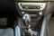 Luxurious car black leather interior. Close-up detail of handbrake manual brake and gearshift stick on blurred dashboard