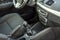 Luxurious car black leather interior. Handbrake manual brake and gearshift stick on blurred background. Transportation, design,