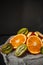 Luxurious fruit background.Orange and kiwi in a cut. Studio photography of various fruits isolated on black background