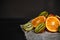 Luxurious fruit background.Orange and kiwi in a cut. Studio photography of various fruits isolated on black background