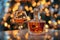 Luxurious glass of cognac alongside beautifully crafted decanter, set against backdrop of festive holiday lights. Warm amber tones