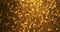 Luxurious gold bokeh background. Abstract background with rotating and shimmering golden bokeh in the form of stars