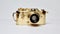 Luxurious Gold Camera On White Surface - Modern Photography