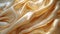 Luxurious golden satin fabric with a smooth, silky texture, rippling in soft waves, perfect for high-end design backgrounds