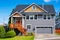 Luxurious gray house with front stairway and porch