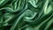 Luxurious green satin fabric texture background