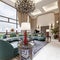 Luxurious large living room with high ceilings and large windows in a modern design with fashionable mars green color upholstered