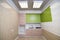 Luxurious laundry in the house with green cupboards, light parquet