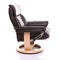 Luxurious leather recliner chair, side on.