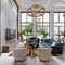 Luxurious living room seating area with blue upholstered furniture in a white interior with high ceilings and large windows with