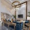 Luxurious living room seating area with blue upholstered furniture in a white interior with high ceilings and large windows with