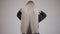 Luxurious long blonde hair in motion. Back view