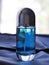 A luxurious perfume bottle, blue style