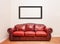 Luxurious Red Leather Couch in front of a blank wall