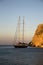 Luxurious sailing boat at sunset in fjord Vathi