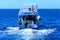 Luxurious snow-white motor yacht in the Red Sea against the blue sky near the unique Ras