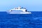 Luxurious snow-white motor yacht in the Red Sea against the blue sky near the unique Ras