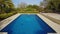 Luxurious swimming pool near the residence, with a garden, with clear water for tourists. In motion in front.