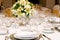 Luxurious table set for a celebration, wedding or event with glassware and cutlery