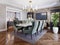 Luxurious trendy dining room interior in art deco style, beige interior with green furniture. Rectangular table with six chairs