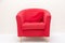 Luxurious wood frame armchair with red fabric seat