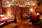 Luxury African tribal hut interior decoration with old vintage wooden furnitures