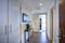 Luxury apartment interior showcases white foyer