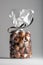 Luxury bag of fresh chestnuts isolated with elegant black ribbon