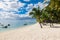 Luxury beach in Mauritius with transparent ocean, white sand beach, palms and sky