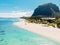 Luxury beach in Mauritius. Tropical beach with palm and transparent ocean. Aerial view