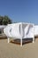 luxury Beach tent on the sea beach with white, fabric, sun protection wooden flooring comfort canopy