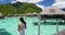 Luxury beach travel vacation woman in Tahiti - Tourist enjoying paradise holiday