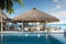 Luxury Beachfront Resort: Serene Infinity Pool, Stylish Patio, and Ocean Paradise