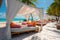 Luxury beachfront white canopies at a resort, scenic beach view