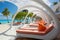 Luxury beachfront white canopies at a resort, scenic beach view